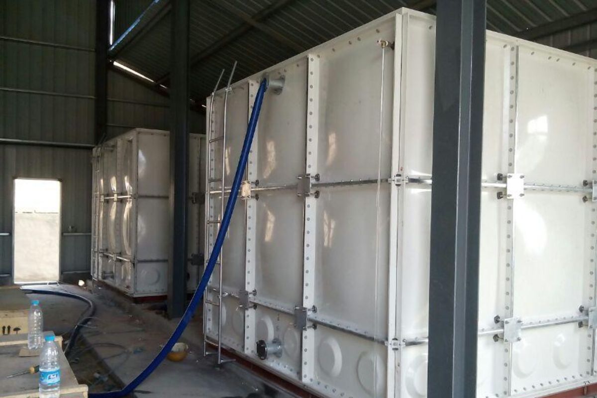 White FRP tanks by Aqua Cube Tank in use