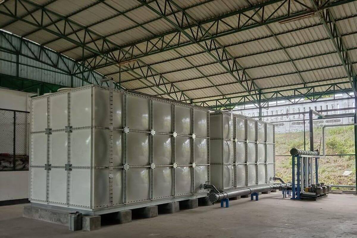 Large modular water tank system installed in a covered facility for maintenance access and future expansion